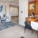 leasing lobby with desk and open seating area to the left of reception area
