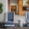 a lounge with a tv and chairs