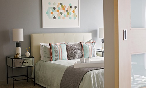 bed with night stand and lamp