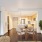 a dining room with a table and chairs