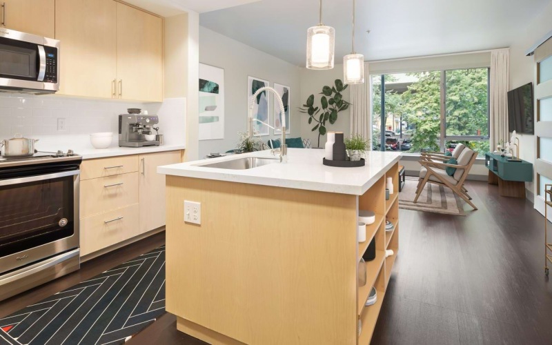 a kitchen with a bar and a stove